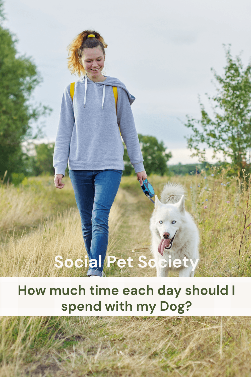 How much time each day should I spend with my dog? A lady walking with her dog.